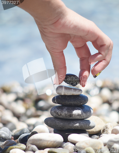 Image of balancing pebble tower