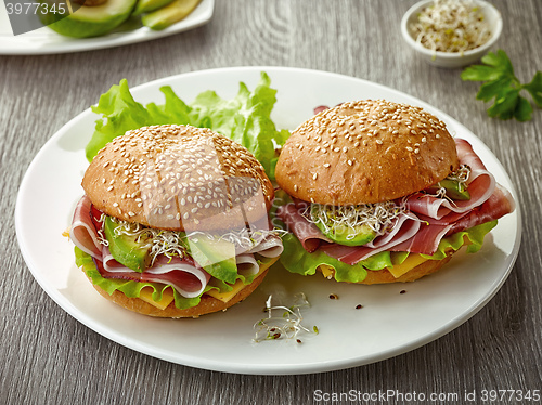 Image of breakfast sandwiches with smoked meat and avocado