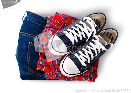 Image of Shirt jeans and sports shoes