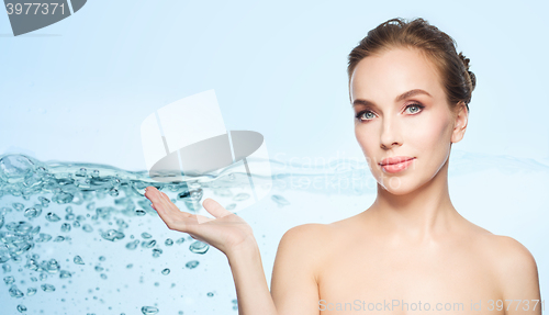 Image of smiling young woman face and shoulders