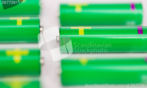 Image of close up of green alkaline batteries