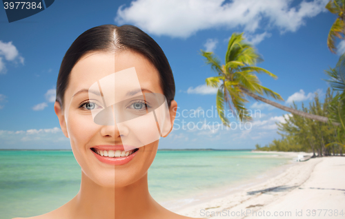 Image of close up of beautiful woman with half face tanned