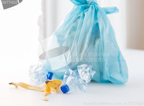 Image of close up of rubbish bag with trash at home