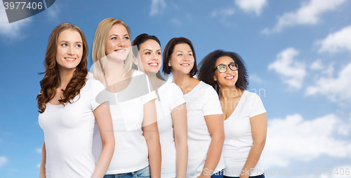 Image of group of happy different women in white t-shirts