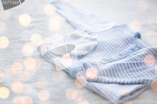 Image of close up of baby boys clothes for newborn on table