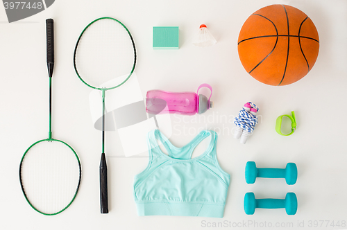 Image of close up of badminton rackets with sports stuff