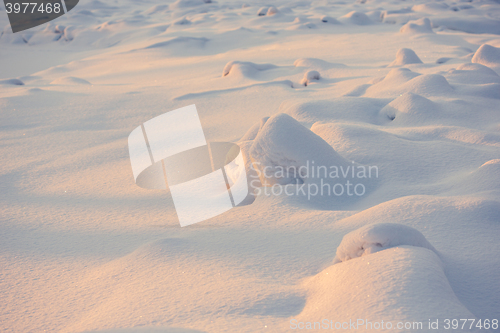 Image of landscape. weather, snowdrifts in the foreground