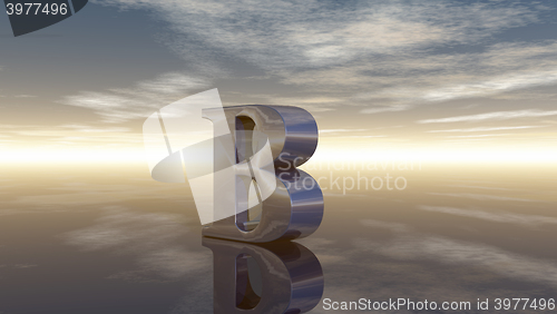 Image of metal uppercase letter b under cloudy sky - 3d rendering