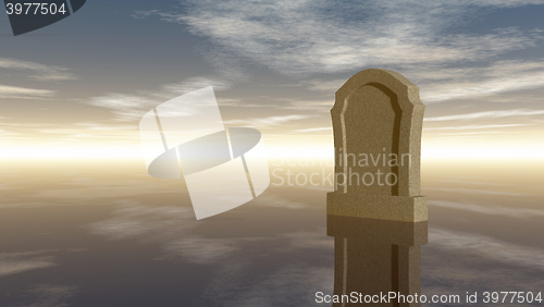 Image of gravestone under cloudy sky - 3d rendering