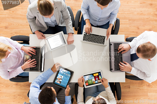 Image of business team with laptop and tablet pc computers