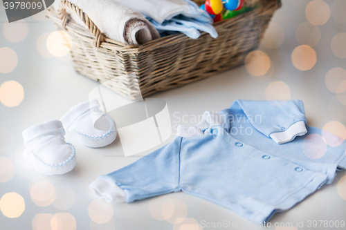 Image of close up of baby clothes for newborn boy in basket