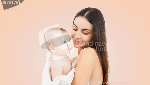 Image of happy mother holding adorable baby