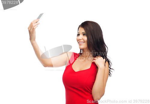 Image of sexy woman taking selfie picture by smartphone