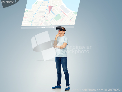 Image of happy man in virtual reality headset or 3d glasses