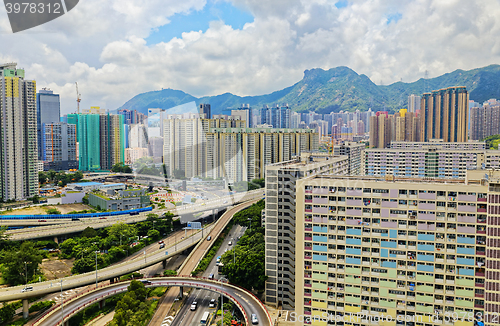 Image of hong kong public estate with landmark lion rock at day