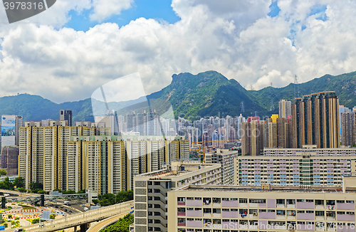 Image of hong kong public estate with landmark lion rock at day