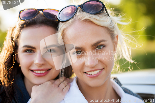 Image of happy young women or teenage girls outdoors