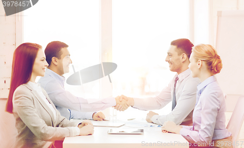 Image of business team having meeting in office