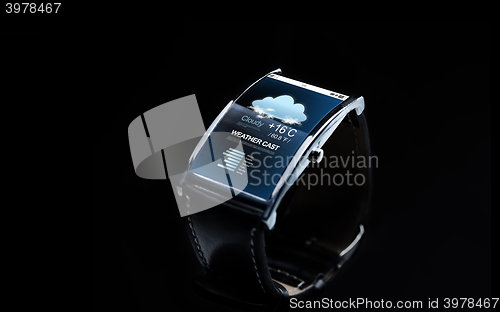 Image of close up of smart watch with weather forecast