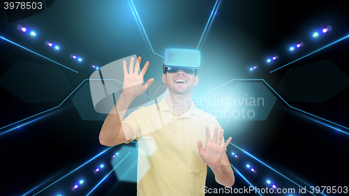 Image of happy man in virtual reality headset or 3d glasses