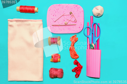 Image of Vintage pink and red accessories for sewing