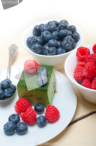 Image of green tea matcha mousse cake with berries