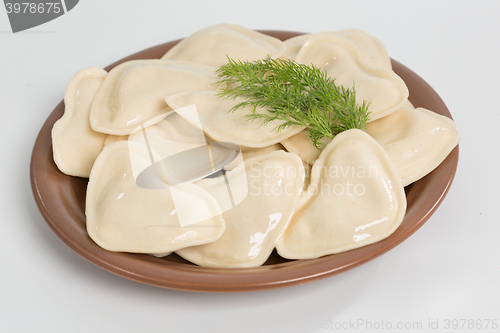 Image of Boiled prepared homemade russian dumplings or pelmeni with beef meat