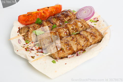 Image of lula kebab with vegetables