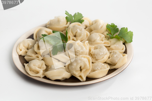 Image of Boiled prepared homemade russian dumplings or pelmeni with beef meat