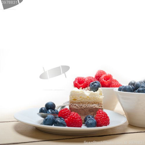 Image of fresh raspberry and blueberry cake