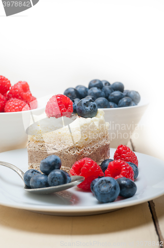 Image of fresh raspberry and blueberry cake