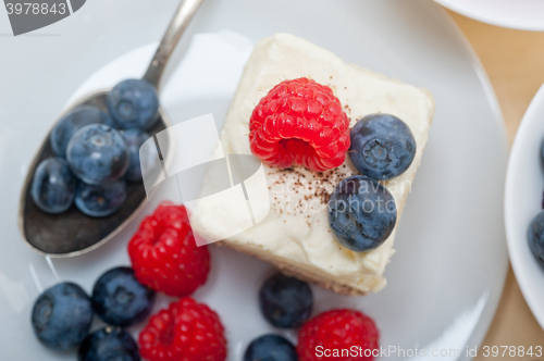 Image of fresh raspberry and blueberry cake