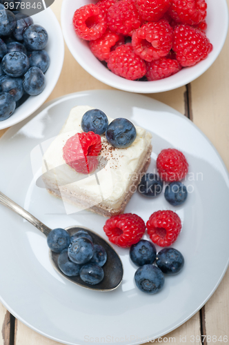 Image of fresh raspberry and blueberry cake