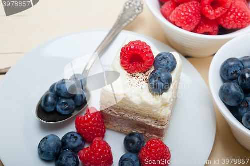 Image of fresh raspberry and blueberry cake