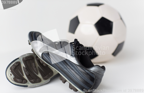Image of close up of soccer ball and football boots
