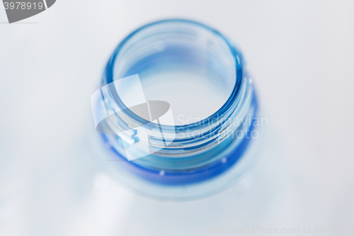 Image of close up of empty used plastic water bottle