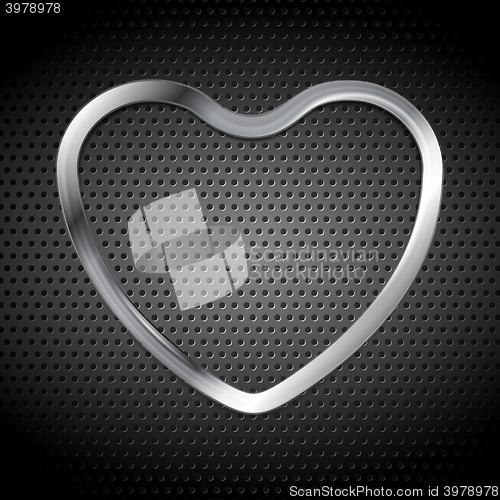 Image of Metallic heart on perforated background