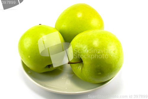 Image of tree apples on a plate