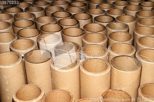 Image of Manufacturing background in the form of cardboard tubes