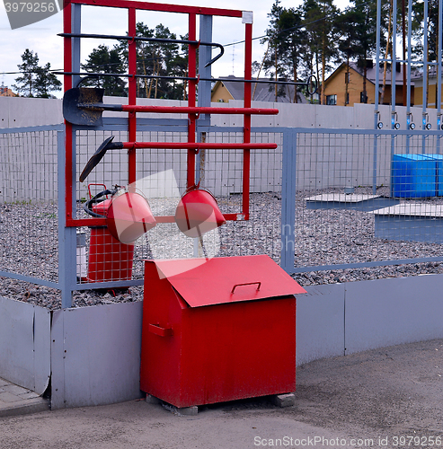 Image of  Fire Shield on the wall. Set primary fire extinguishing equipment.