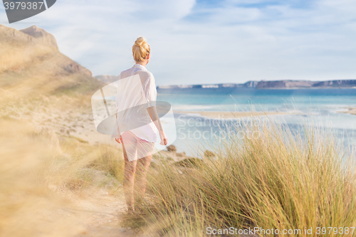 Image of Free Happy Woman Enjoying Sun on Vacations.