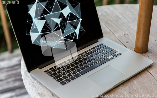 Image of close up of laptop computer on table at hotel