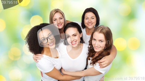 Image of group of happy different women in white t-shirts