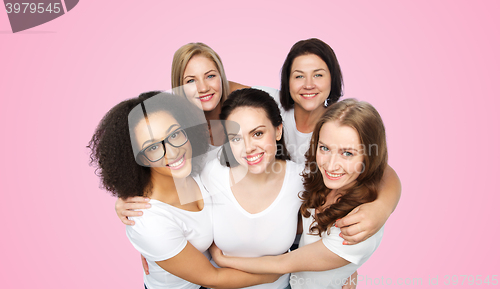 Image of group of happy different women in white t-shirts