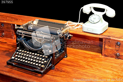 Image of Typewriter and phone