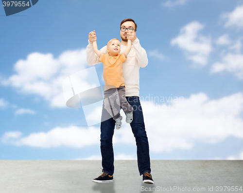 Image of father with son playing and having fun