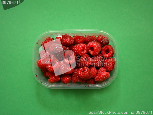 Image of Fresh raspberries in plastic box