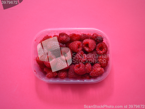 Image of Fresh raspberries in plastic box