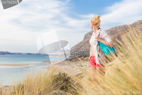 Image of Free Happy Woman Enjoying Sun on Vacations.