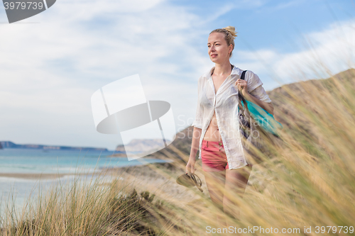 Image of Free Happy Woman Enjoying Sun on Vacations.